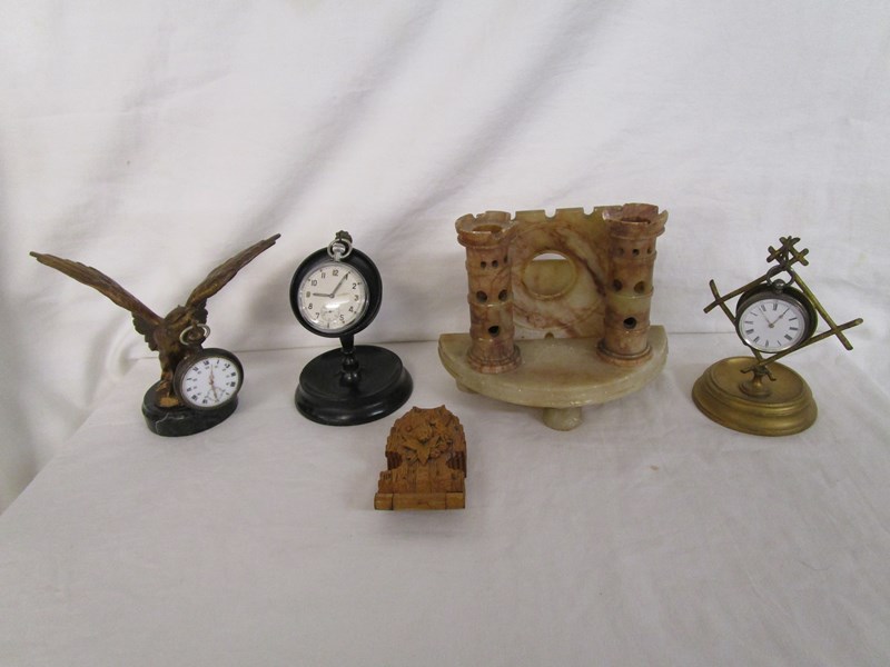 Collection of pocket watch stands etc