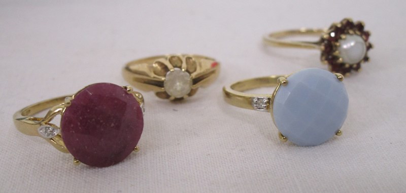 4 ladies gold rings to include amethyst & sapphire