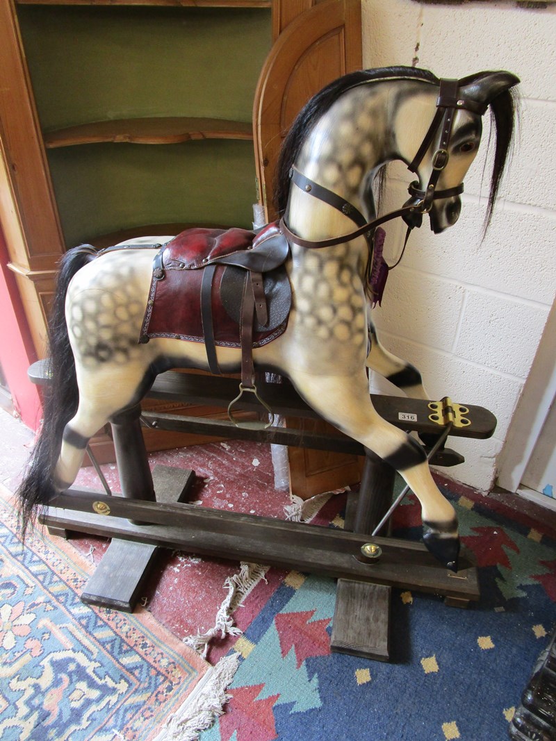 Quality wooden rocking horse by the Worcester Rocking Horse Co (H: 123cm L: 123cm)