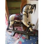 Quality wooden rocking horse by the Worcester Rocking Horse Co (H: 123cm L: 123cm)
