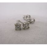 Pair of 18ct gold diamond stud earrings