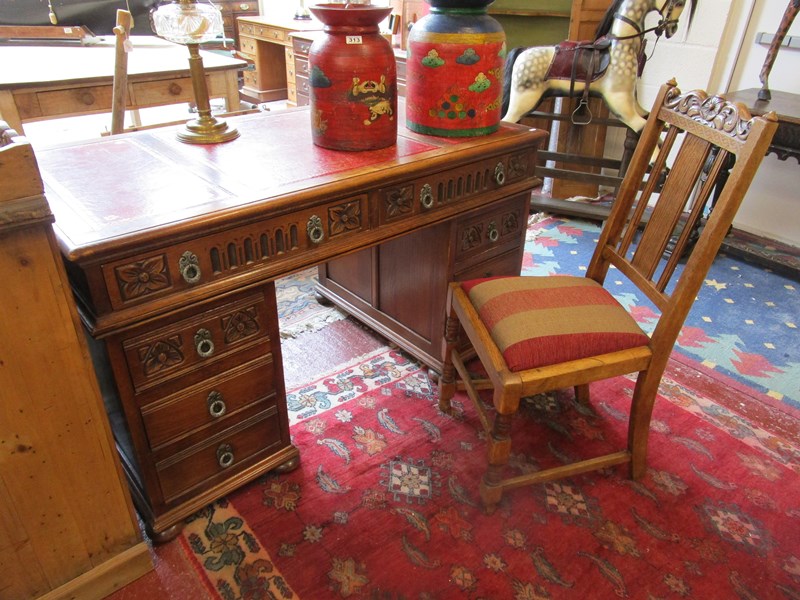 Fine quality oak pedestal desk ( H: 80cm W: 137cm D: 77cm) with red leather top and matching chair
