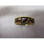 Gold, ruby & diamond set band ring