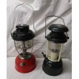 2 hurricane lamps