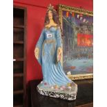 Figure of lady in blue dress