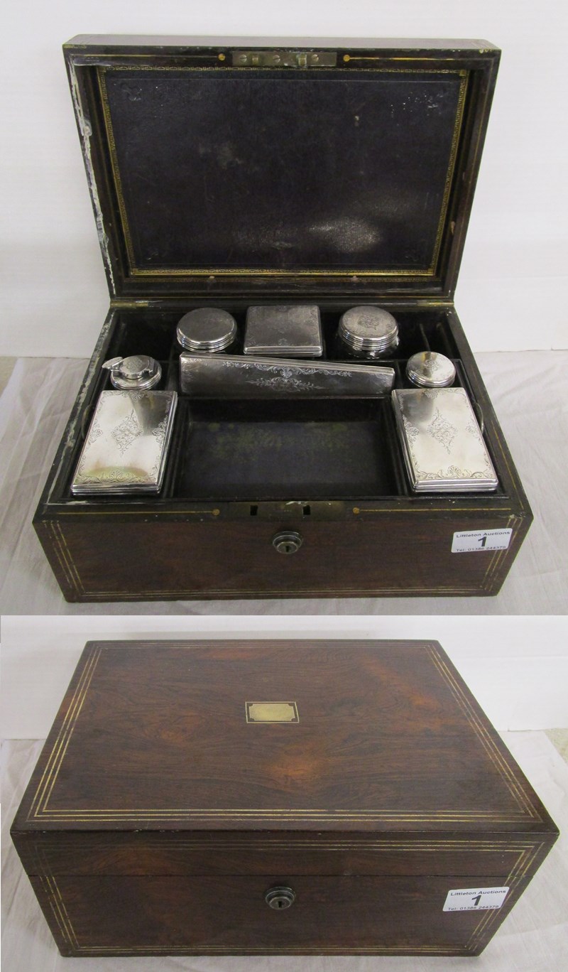 Early 19C rosewood vanity box with silver topped glass bottles