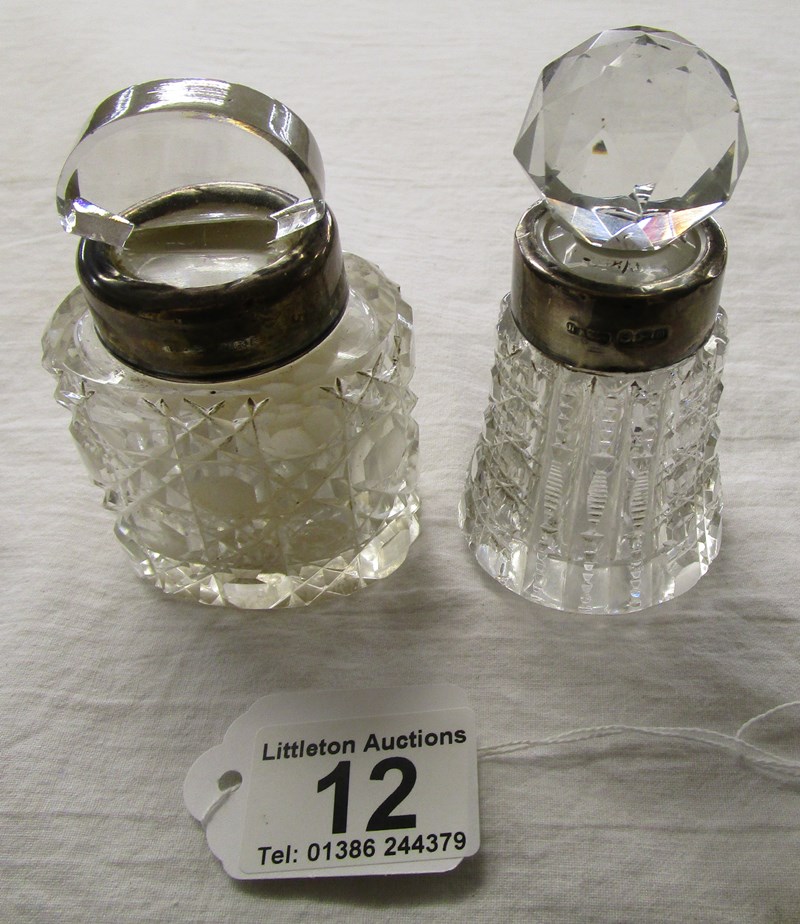 2 silver mounted bottles