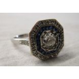Art Deco style sapphire ring with large central diamond