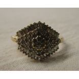 Gold diamond cluster ring set with baguettes