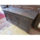 Carved oak coffer with candle box