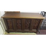 Oak coffer with carved panels
