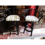 2 bentwood swivel bar stools