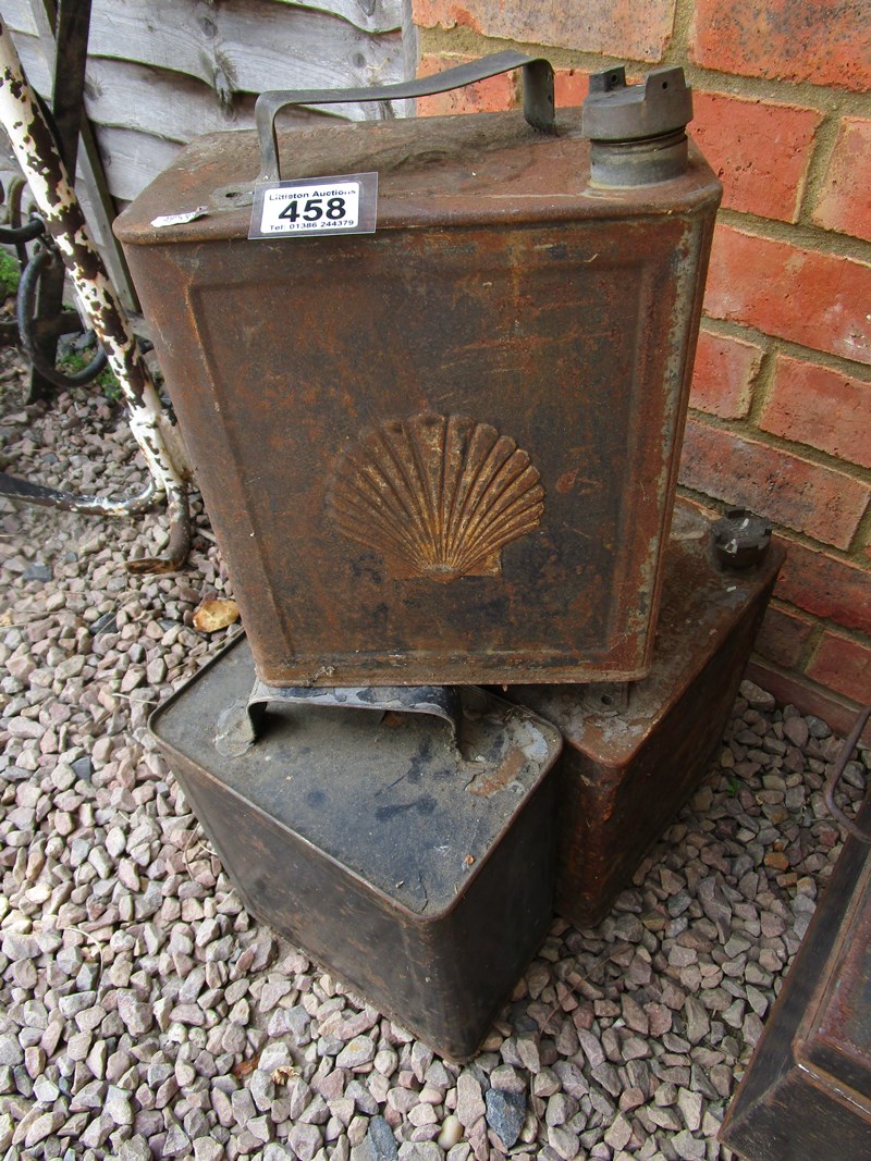 4 early petrol cans to include shell