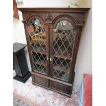 Oak display cabinet with leaded glass
