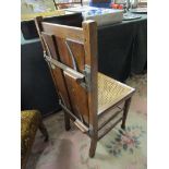 Unusual cane seated chair with trouser press to rear