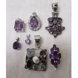 7 silver and amethyst pendants