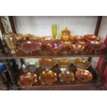 2 shelves of carnival glass to include Sowerby & Dugan
