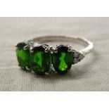 White gold green garnet & diamond set ring