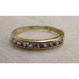 Gold amethyst set half eternity ring