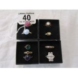 9 assorted gold and stone rings