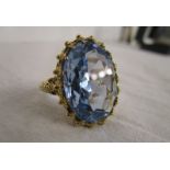 Large gold blue topaz set ring