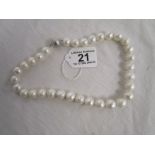 Pearl necklace with large white gold clasp