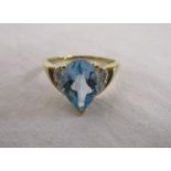 Gold blue topaz and diamond set ring