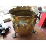 Brass coal bin on claw feet