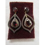 Pair of garnet and diamond drop earrings
