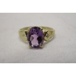 Gold oval natural amethyst & diamond ring