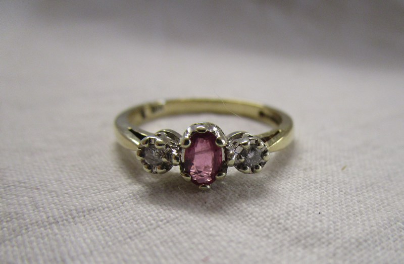 Gold ruby and diamond 3 stone ring