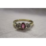 Gold ruby and diamond 3 stone ring
