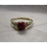 Gold coral and diamond set ring