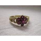 Gold ruby set cluster ring