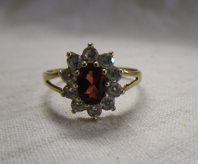 Gold garnet cluster ring