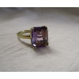 Gold amethyst and diamond set ring