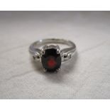 White gold garnet set ring