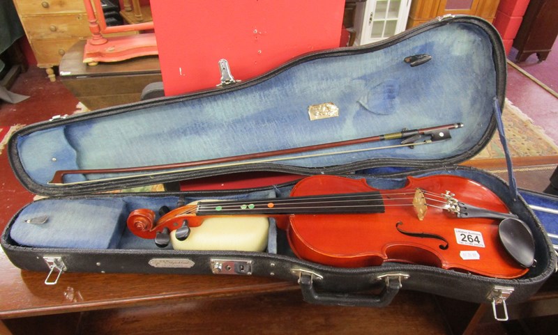 Cased violin