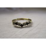 Gold sapphire and stone set wishbone ring