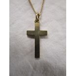 Gold cross on chain