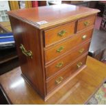 Small table top chest of 2 over 3 drawers