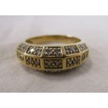 Gold triple row diamond set ring