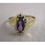 Gold designer amethyst set ring