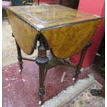 Leather top walnut card table on casters