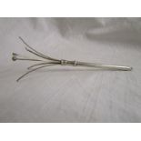 Silver cocktail swizzle stick