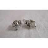 Pair of 18ct princess cut diamond stud earrings