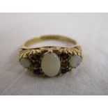 Gold opal & garnet gypsy set ring