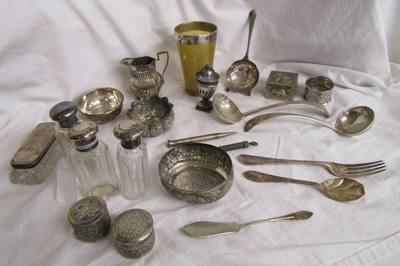 Collection of silver, silver topped bottles and white metal