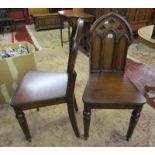 Pair of Gothic themed mahogany hall chairs