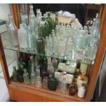 2 shelves of early bottles to include glass & stoneware